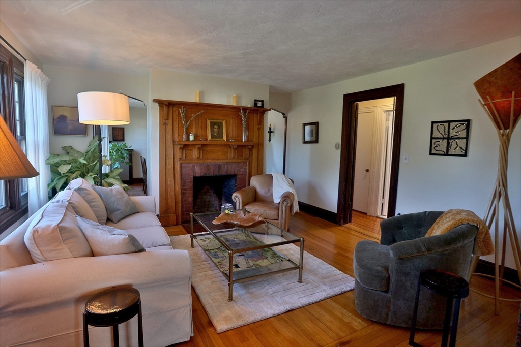 4 Willow Avenue, Unit 2 Salem, MA 01970 - Photo 20 of 41 a living room with furniture and a fireplace
