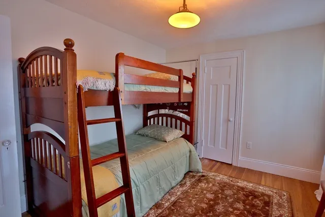 a bedroom with furniture and window