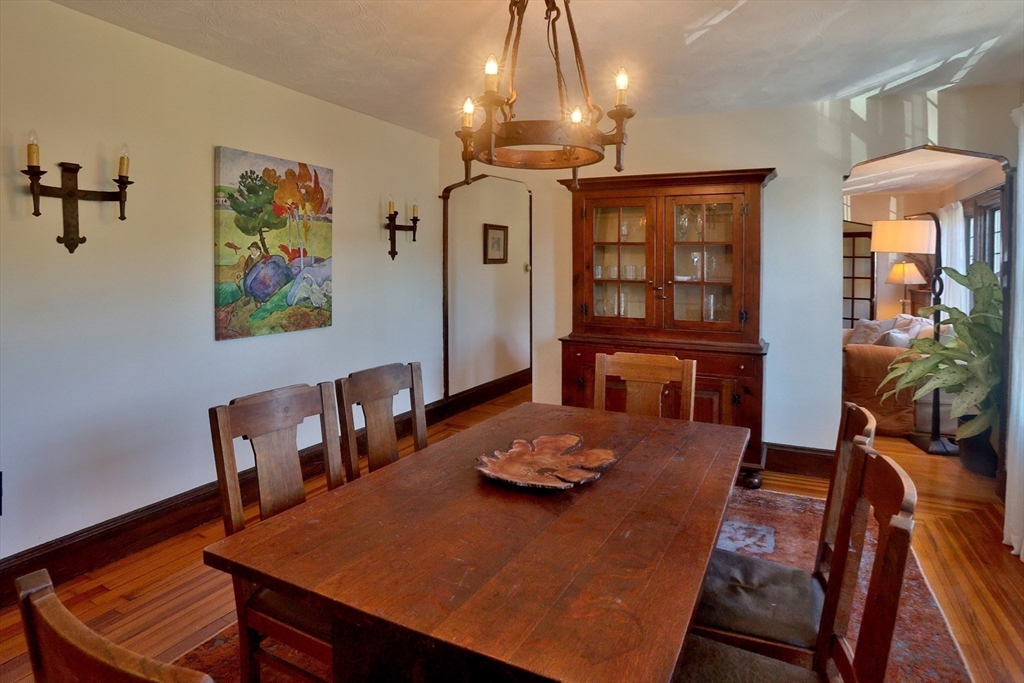4 Willow Avenue, Unit 2 Salem, MA 01970 - Photo 29 of 41 a view of a dining room with furniture a chandelier and wooden floor