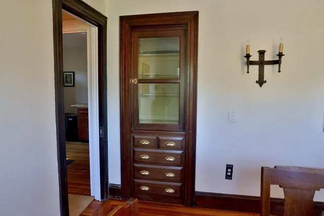 a view of a hallway with closet