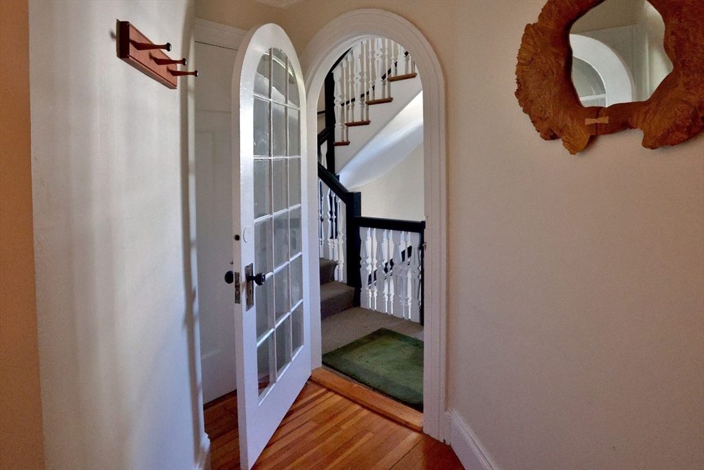 4 Willow Avenue, Unit 2 Salem, MA 01970 - Photo 5 of 41 a view of staircase with white walls and stairs