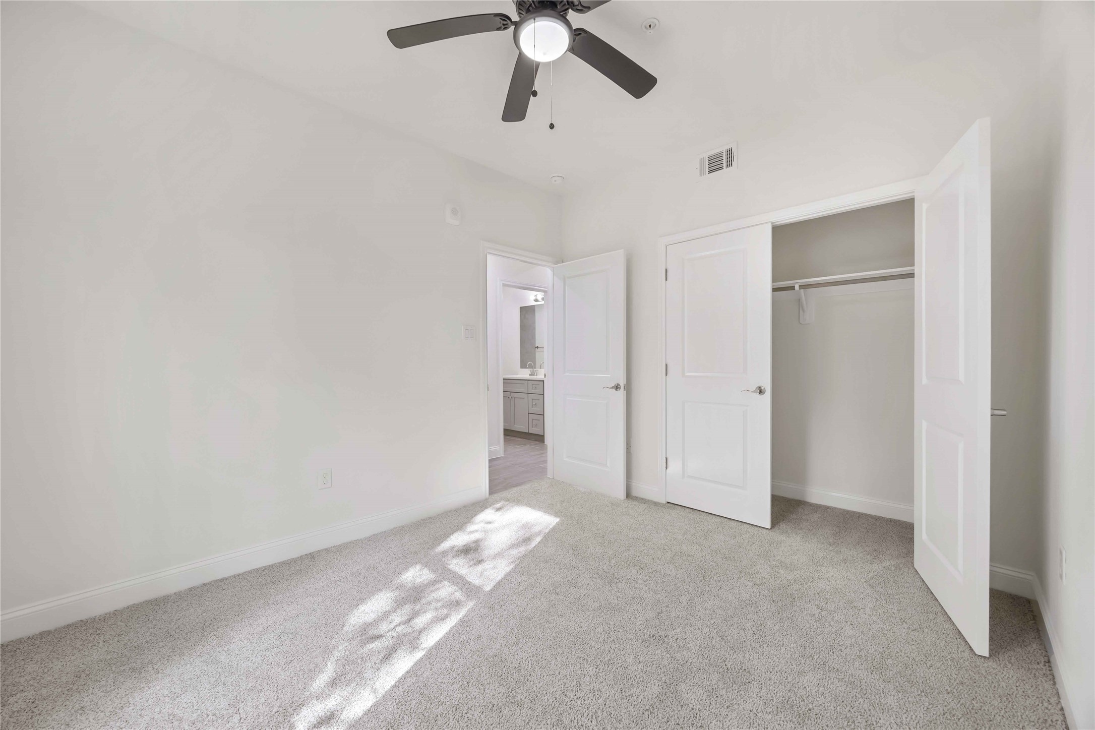 9129 Brandon Street, Unit A7 Houston, TX 77051 - Photo 11 of 15 a view of empty room with ceiling fan