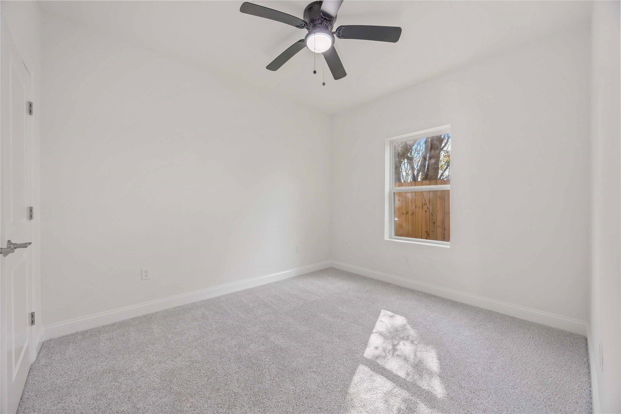 9129 Brandon Street, Unit A7 Houston, TX 77051 - Photo 12 of 15 a view of empty room with window