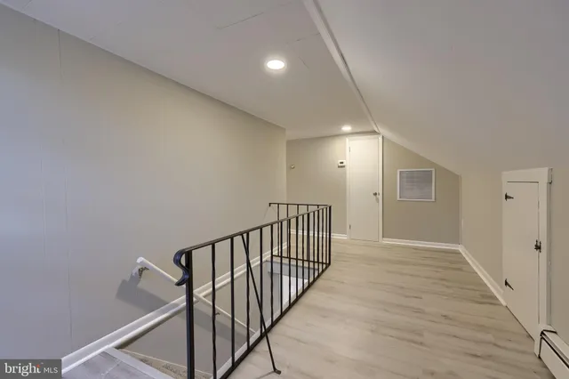 a view of hallway with stairs