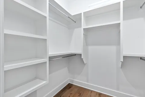 a view of an empty walk in closet