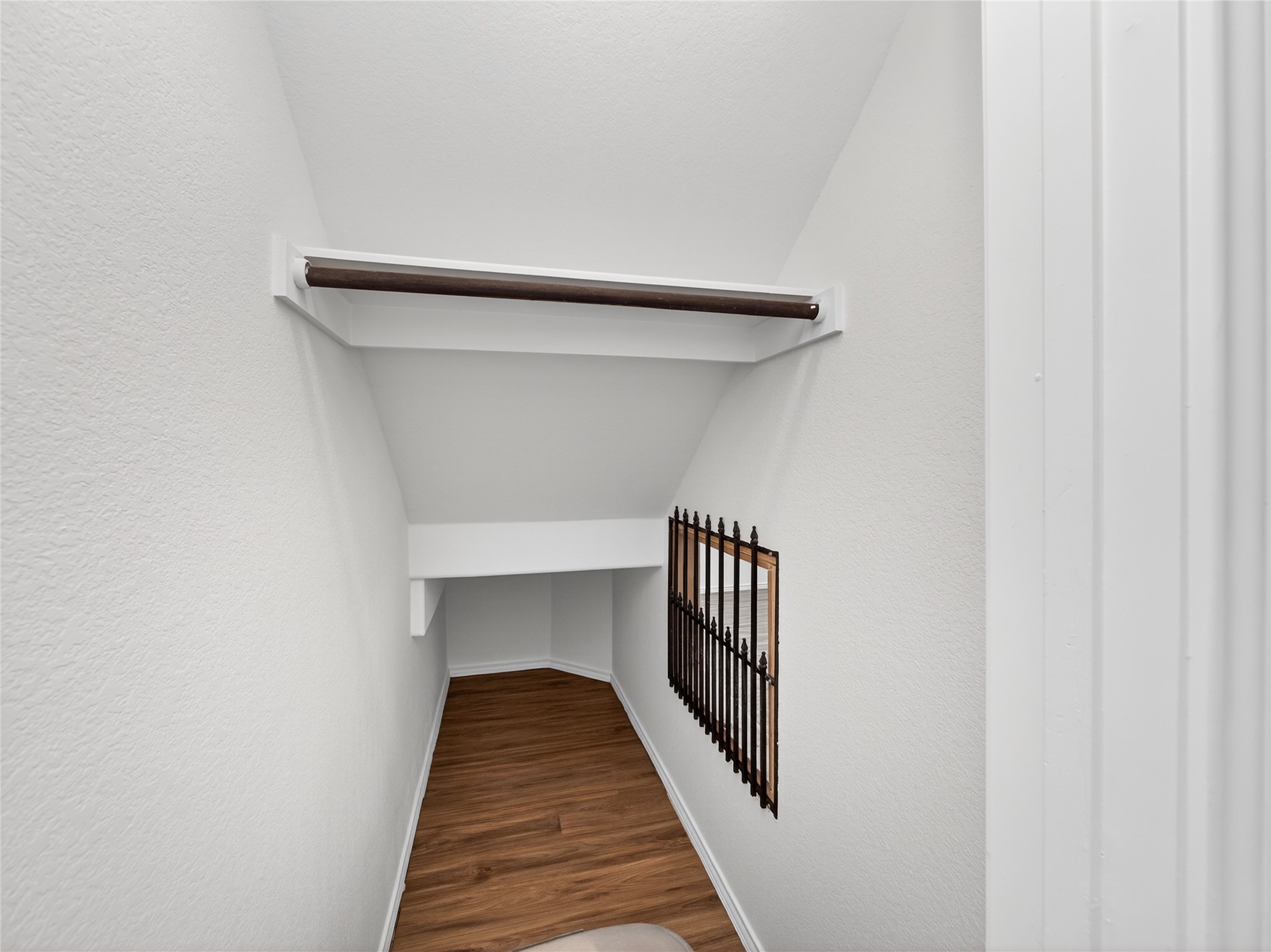 156 Greatest Gift Way Jarrell, TX 76537 - Photo 11 of 40 a view of a hallway with wooden floor