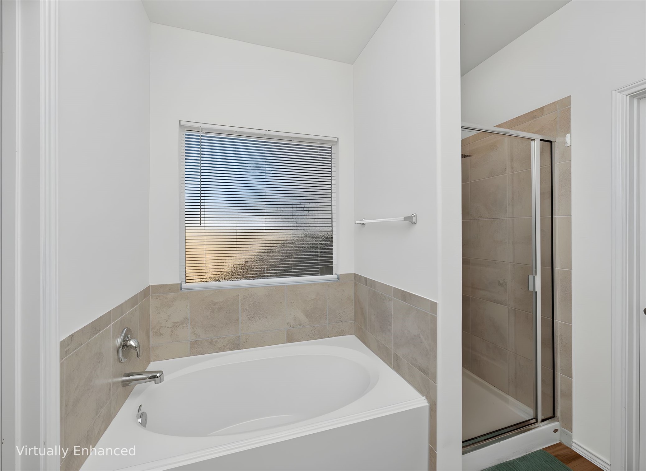 156 Greatest Gift Way Jarrell, TX 76537 - Photo 17 of 40 a bath tub sitting next to a window