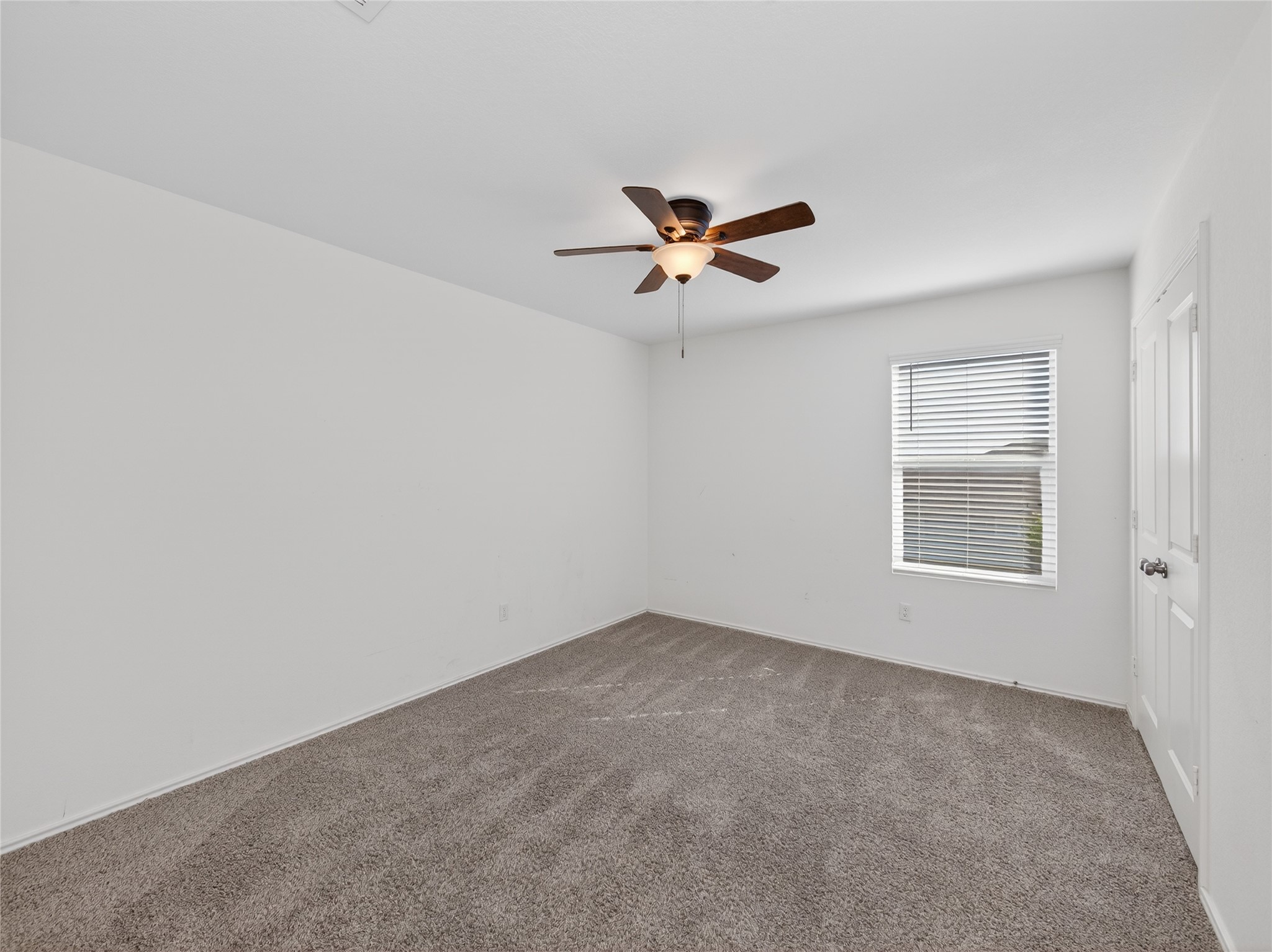 156 Greatest Gift Way Jarrell, TX 76537 - Photo 22 of 40 a view of a big room with carpet