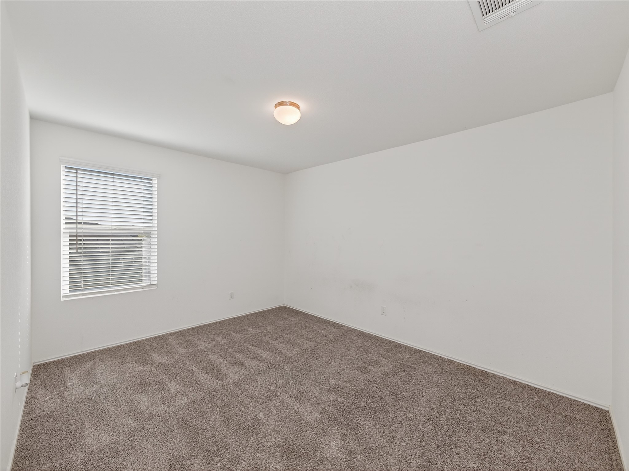 156 Greatest Gift Way Jarrell, TX 76537 - Photo 25 of 40 an empty room with a window