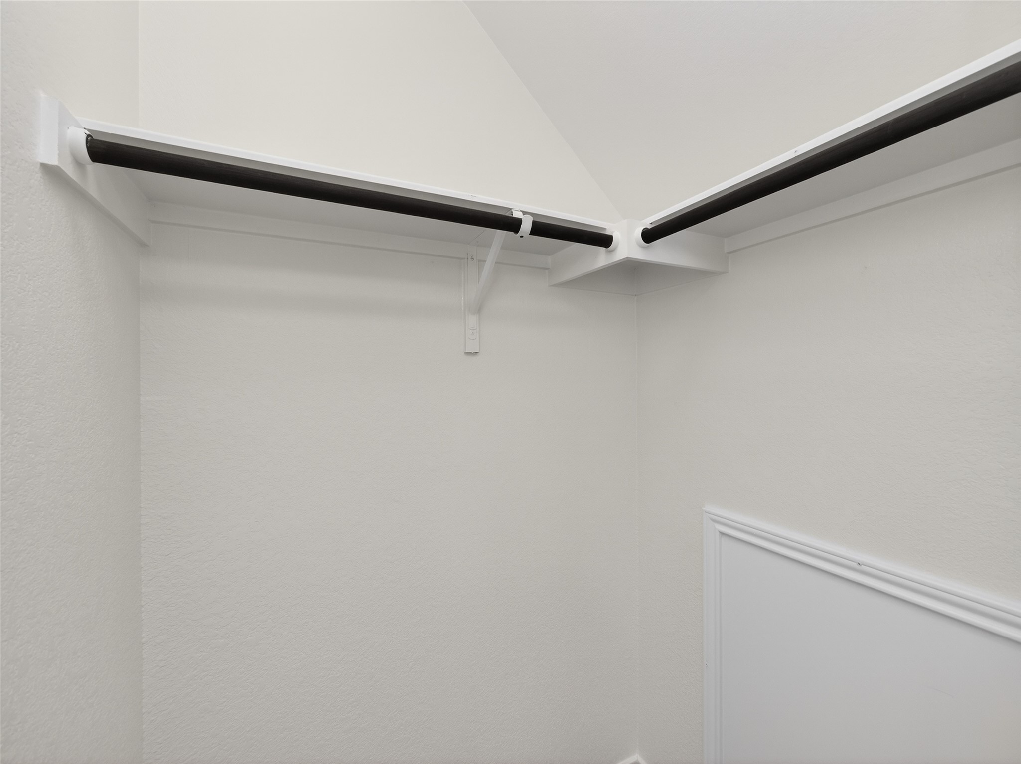 156 Greatest Gift Way Jarrell, TX 76537 - Photo 30 of 40 a view of a room with racks on the wall