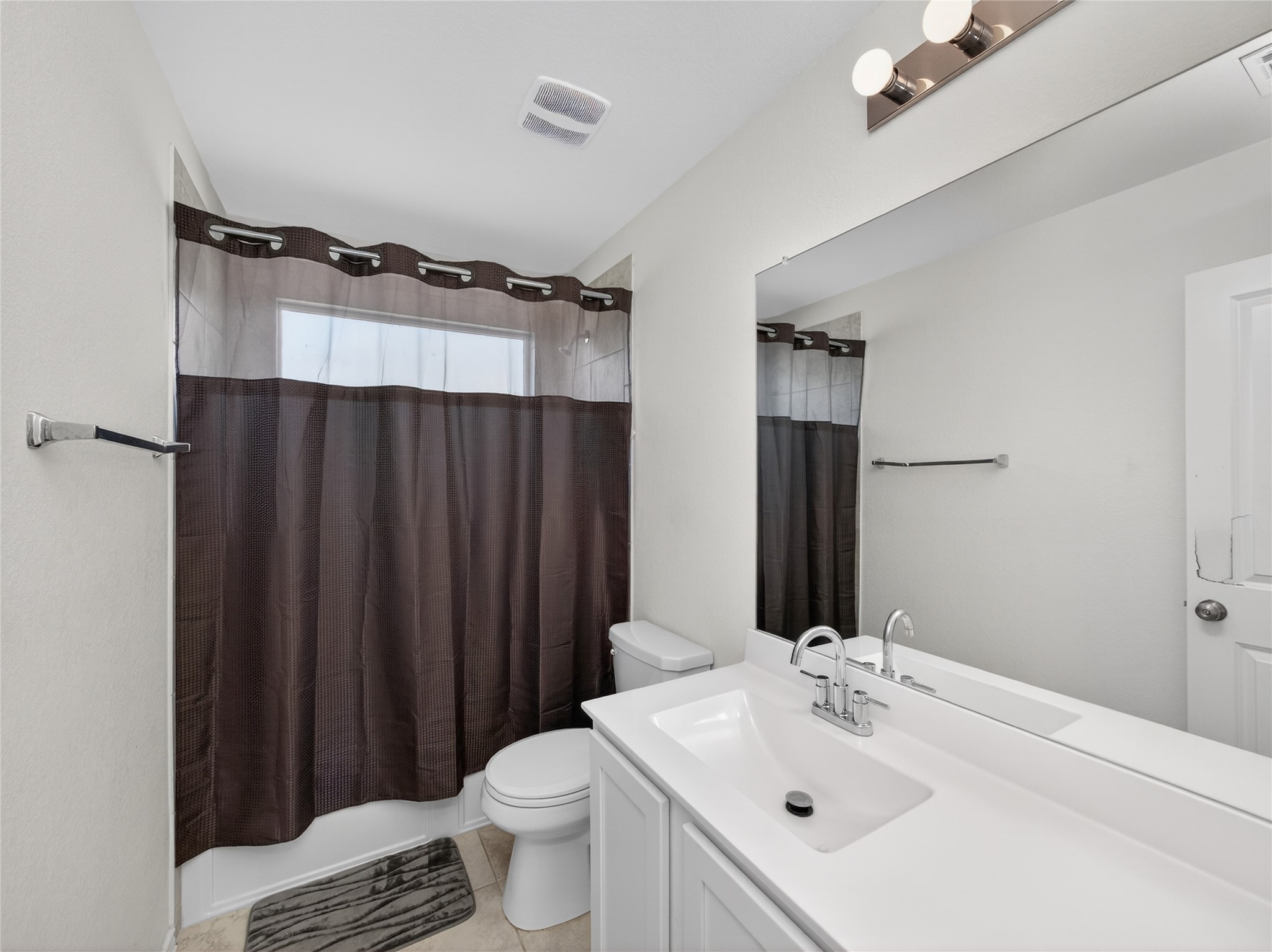 156 Greatest Gift Way Jarrell, TX 76537 - Photo 31 of 40 a bathroom with a sink and a mirror