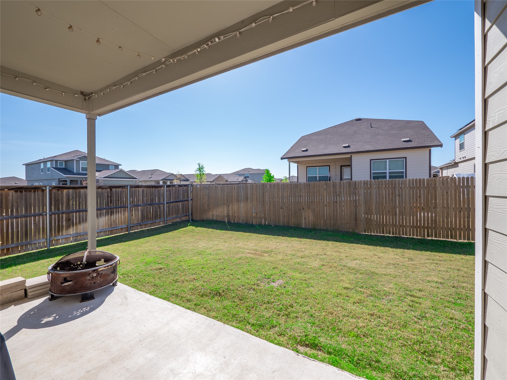 156 Greatest Gift Way Jarrell, TX 76537 - Photo 32 of 40 a view of a backyard