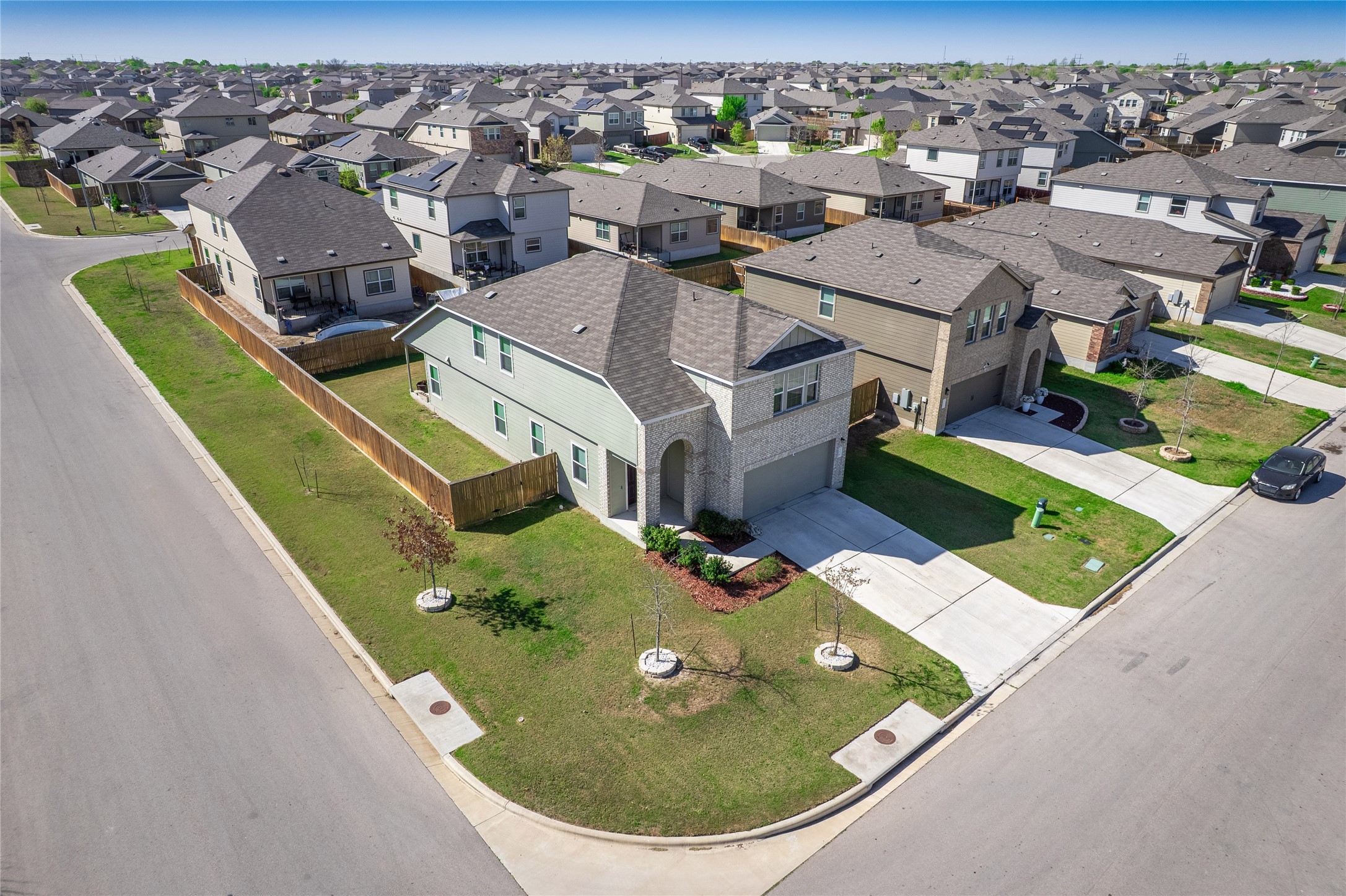156 Greatest Gift Way Jarrell, TX 76537 - Photo 35 of 40 an aerial view of a house with a swimming pool
