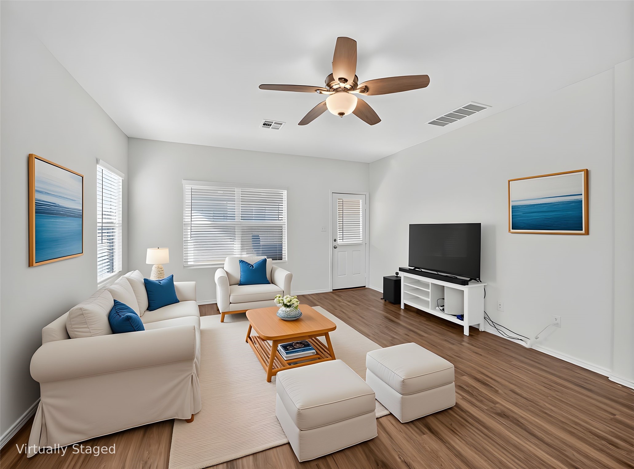 156 Greatest Gift Way Jarrell, TX 76537 - Photo 4 of 40 a living room with furniture and a flat screen tv