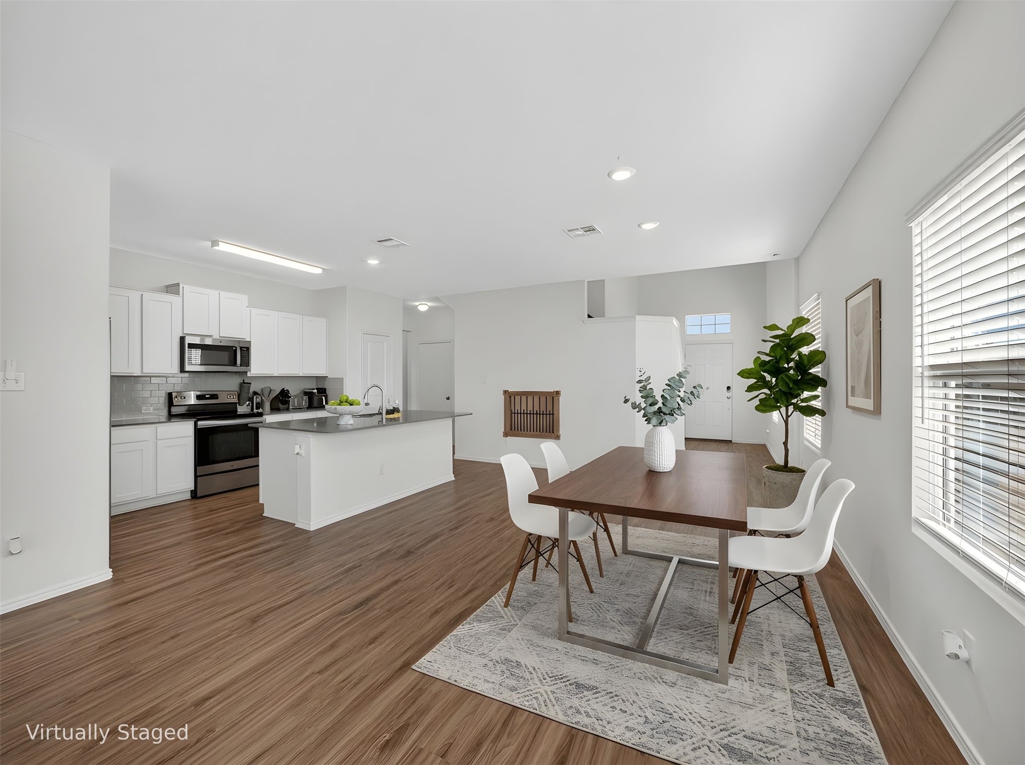 156 Greatest Gift Way Jarrell, TX 76537 - Photo 6 of 40 a kitchen with sink and refrigerator