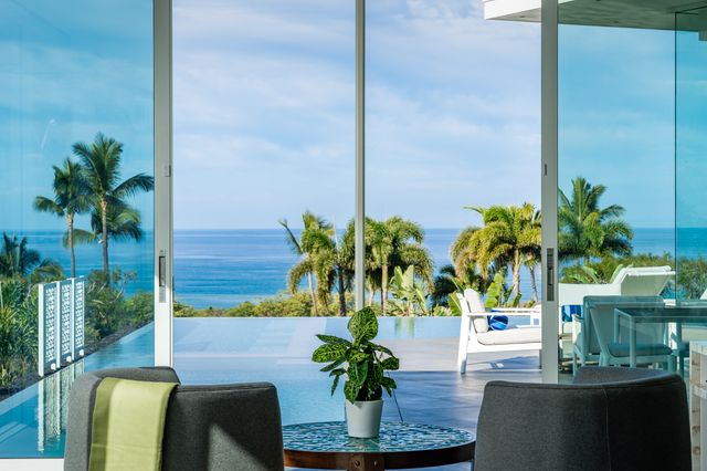 a view of a livingroom with furniture and a fireplace