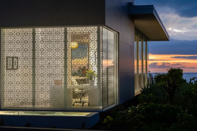 a dining room filled with furniture and window