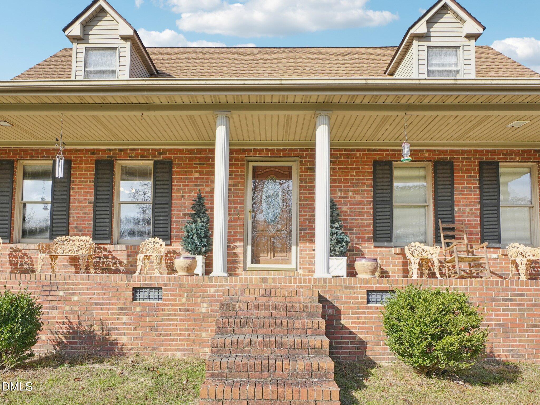 750 Stephenson Road Benson, NC 27504 - Photo 3 of 21 a view of pool with outdoor seating