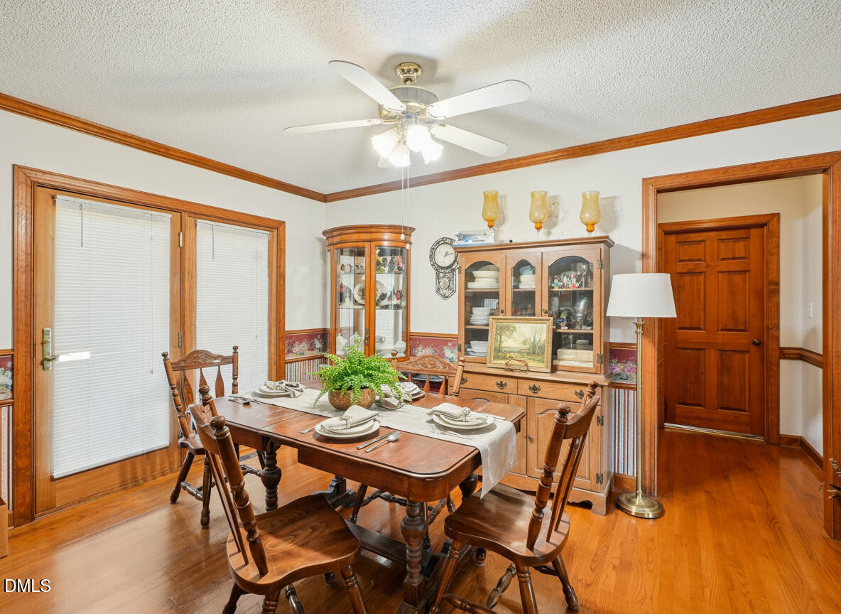 750 Stephenson Road Benson, NC 27504 - Photo 6 of 21 a view of a dining room with furniture window and wooden floor