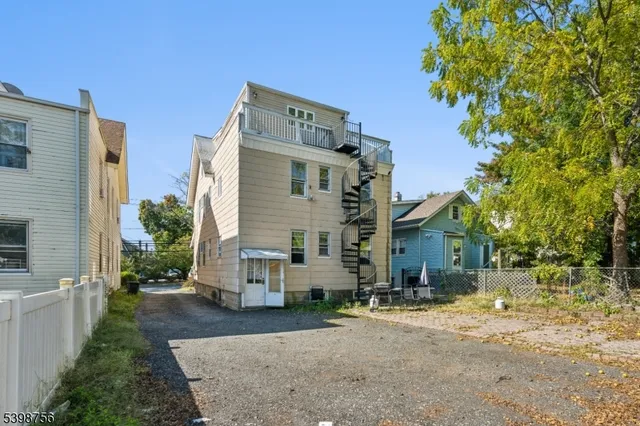 front view of a house with a street