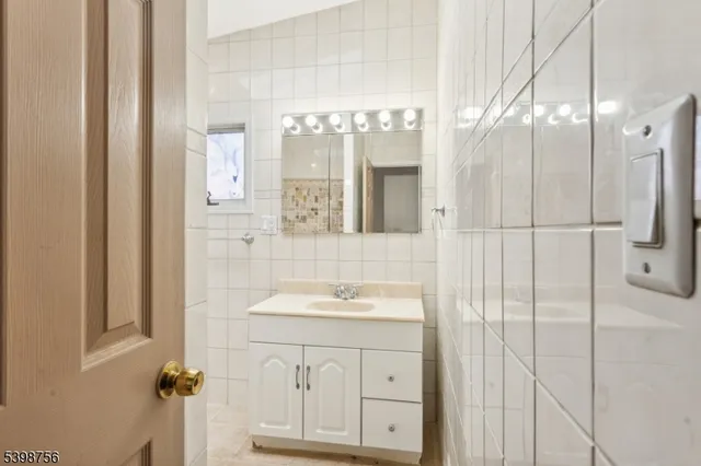 a bathroom with a toilet and a bathtub