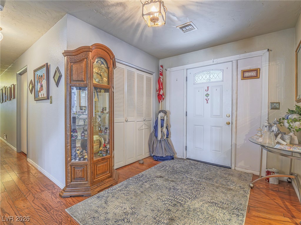 846 Fairview Drive Henderson, NV 89015 - Photo 12 of 39 Entryway featuring wood finished floors and baseboards