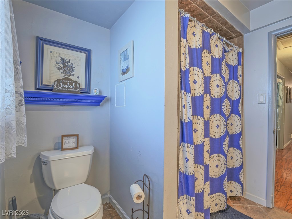 846 Fairview Drive Henderson, NV 89015 - Photo 23 of 39 Full bath featuring a shower with shower curtain and tile patterned floors