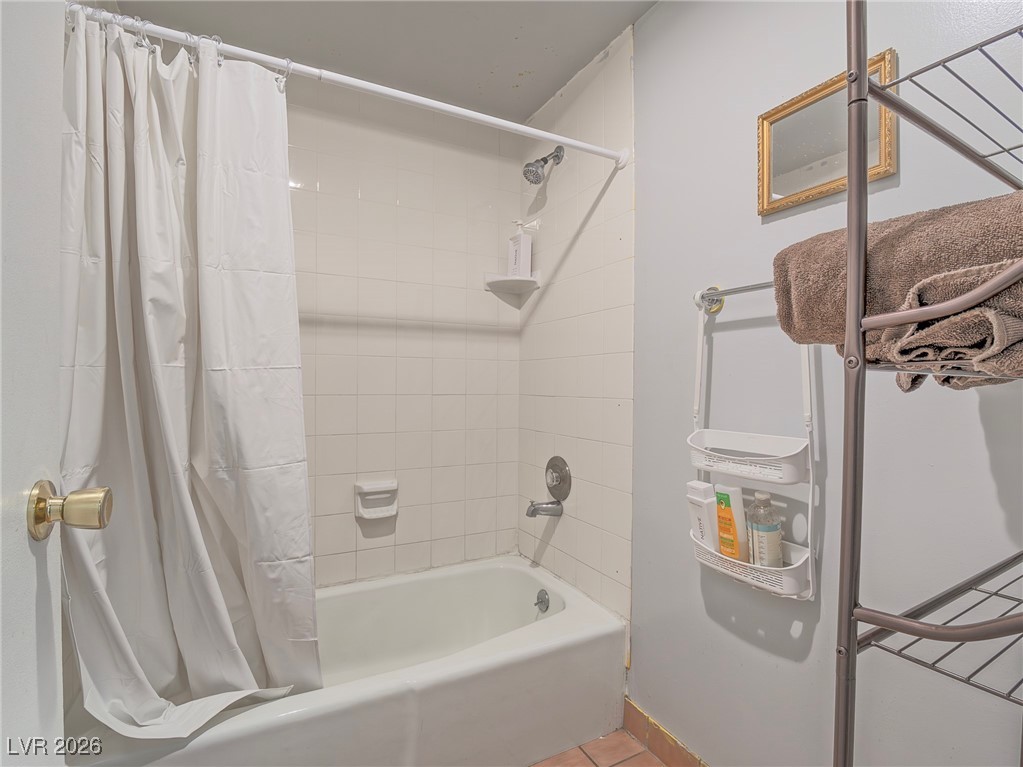 846 Fairview Drive Henderson, NV 89015 - Photo 34 of 39 Full bath featuring shower / bathtub combination with curtain and tile patterned floors