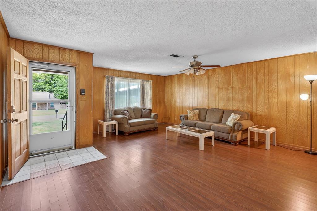 624 North Ave A Springtown, TX 76082 - Photo 7 of 29 a living room with furniture and a large window