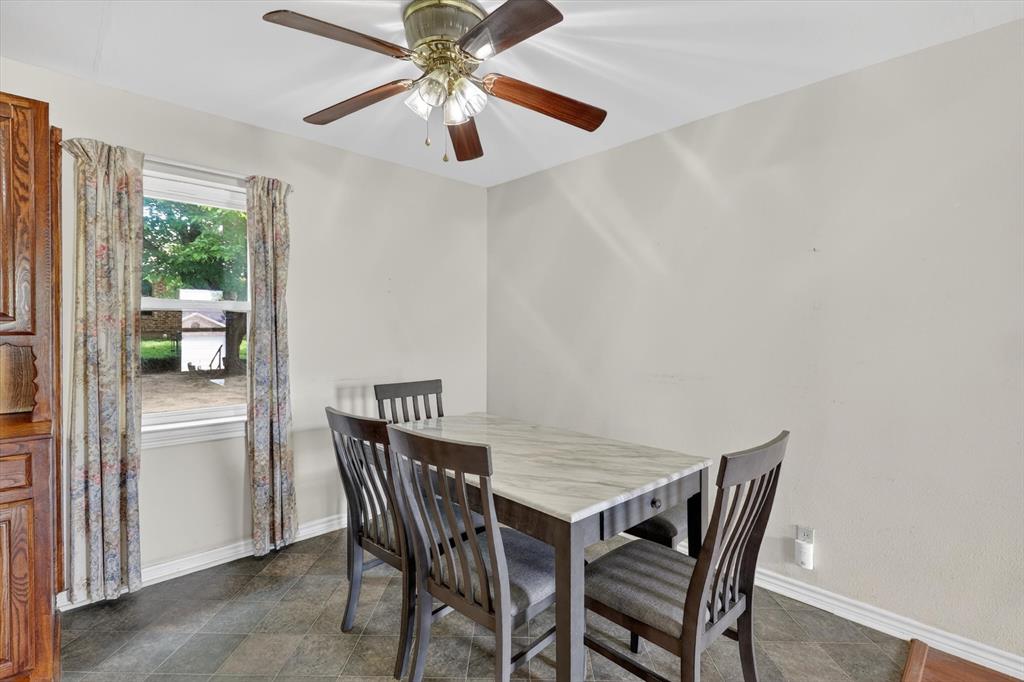 624 North Ave A Springtown, TX 76082 - Photo 9 of 29 a view of a dining room with furniture