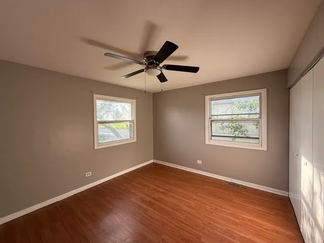a bathroom with a toilet a sink and shower