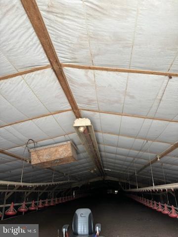 12911 Trussum Pond Road Laurel, DE 19956 - Photo 11 of 15 a room with water heater and racks