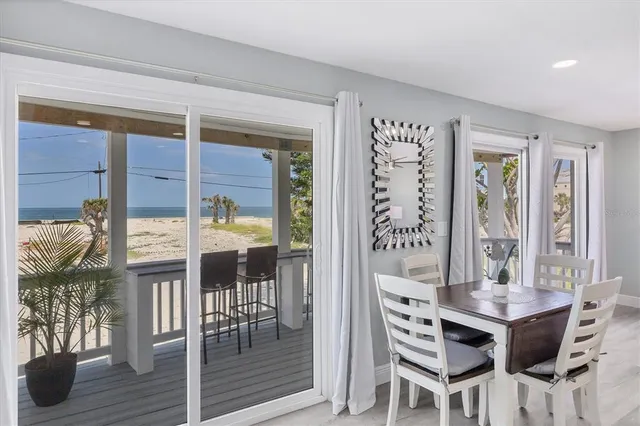 a view of a balcony with chairs