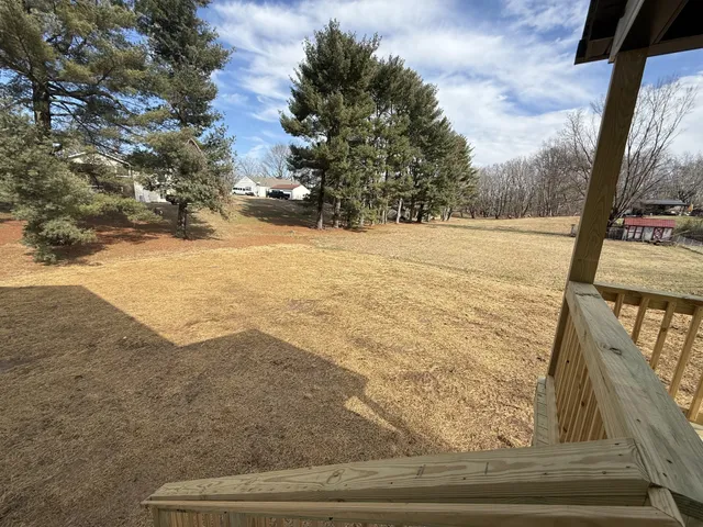 a view of a yard with an outdoor space
