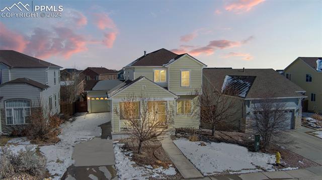 10165 Angeles Road Peyton, CO 80831 - Photo 4 of 38 Front facade featuring a garage