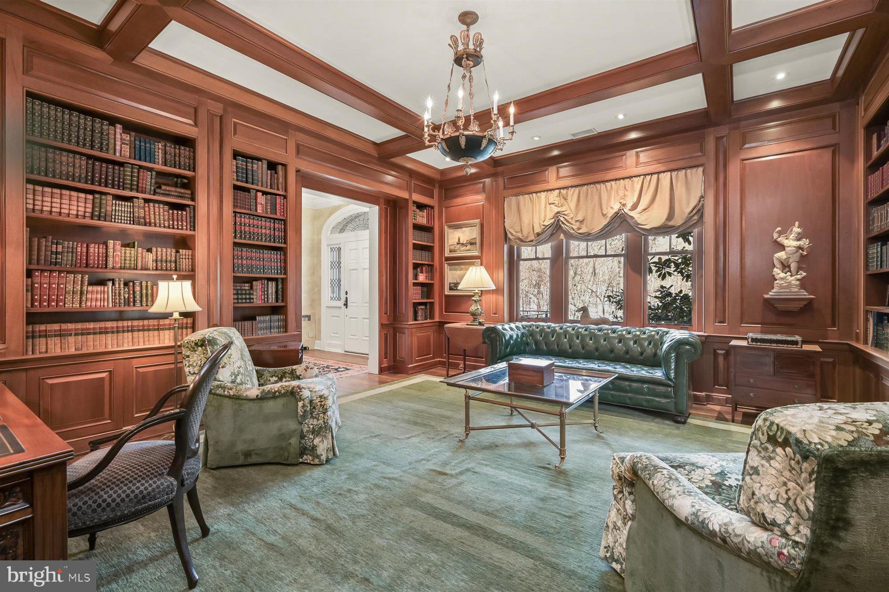 5320 27th Street Northwest Washington, DC 20015 - Photo 14 of 42 a living room with furniture and a chandelier