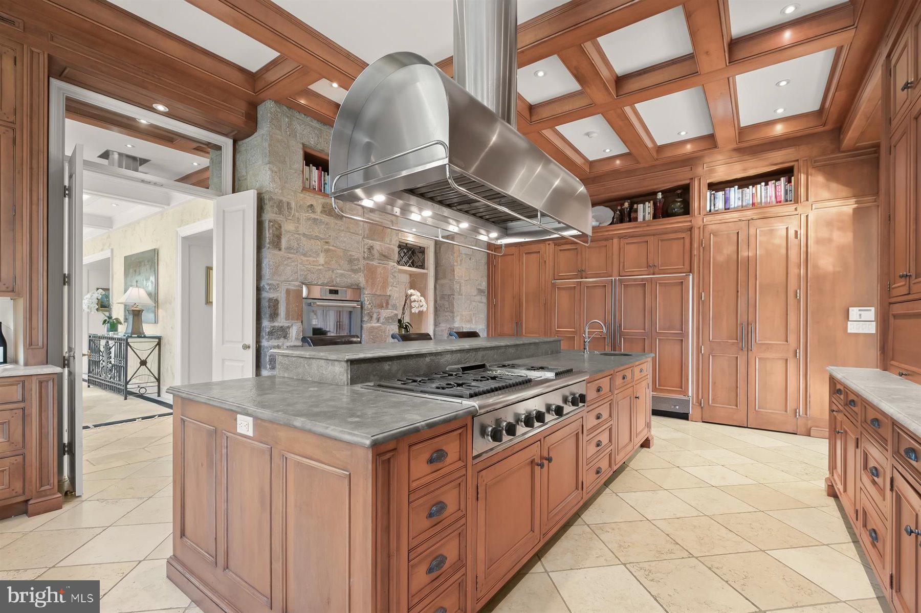 5320 27th Street Northwest Washington, DC 20015 - Photo 16 of 42 a kitchen with stainless steel appliances granite countertop a stove and a sink