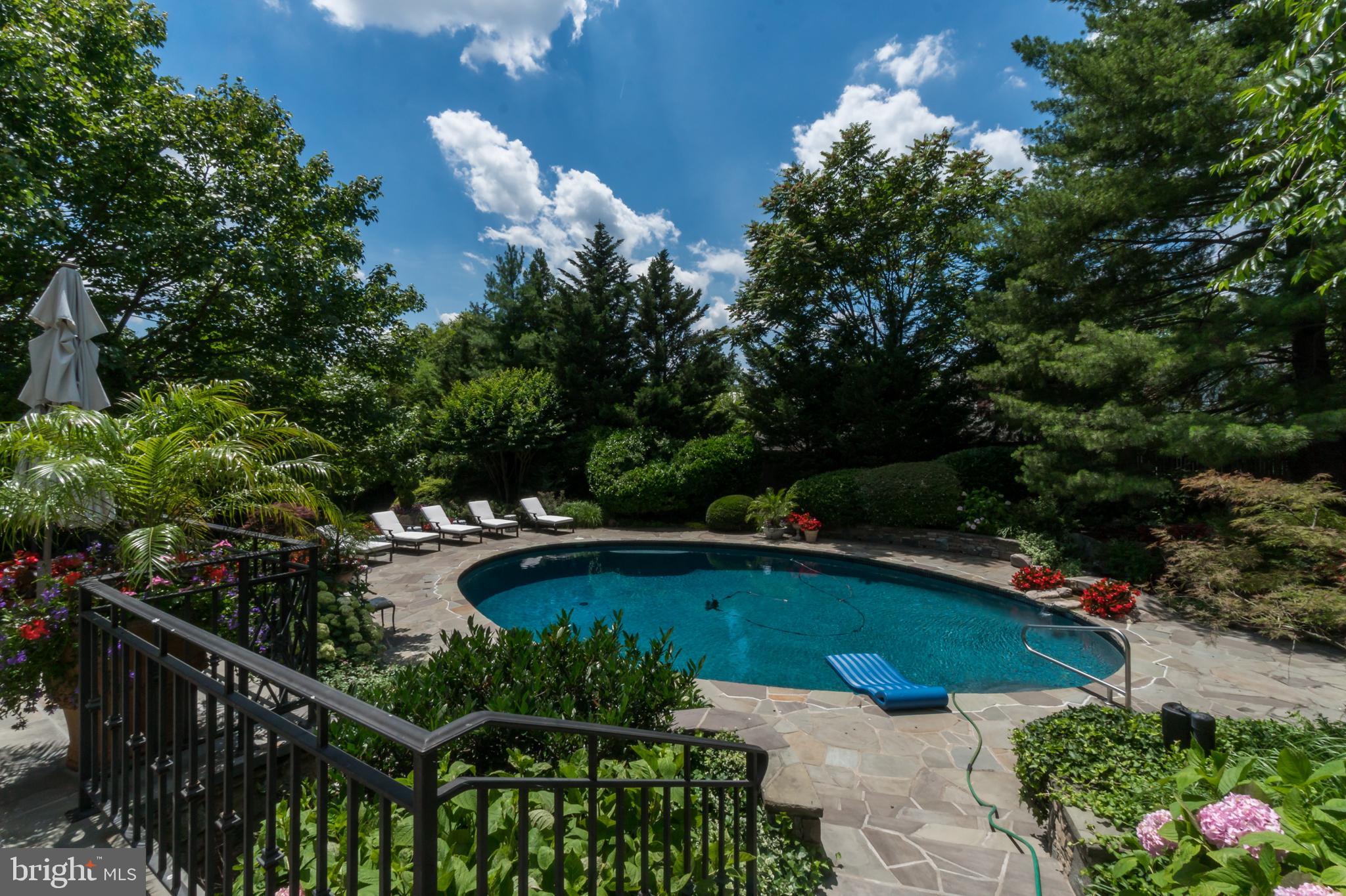 5320 27th Street Northwest Washington, DC 20015 - Photo 2 of 42 a view of a swimming pool and lounge chair