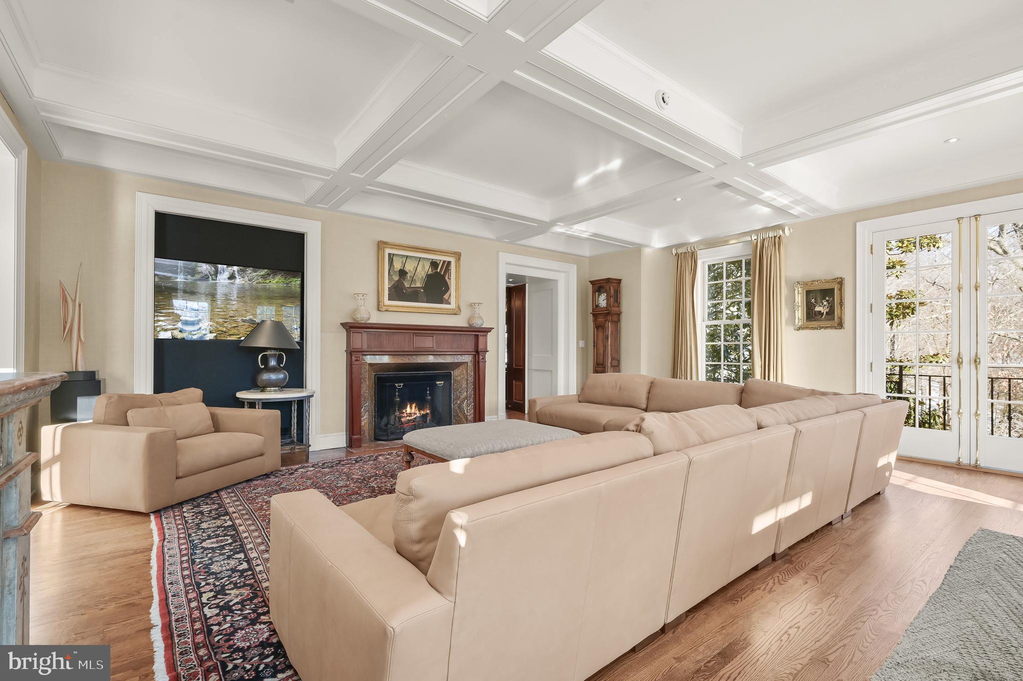 5320 27th Street Northwest Washington, DC 20015 - Photo 22 of 42 a living room with furniture large window and a fireplace