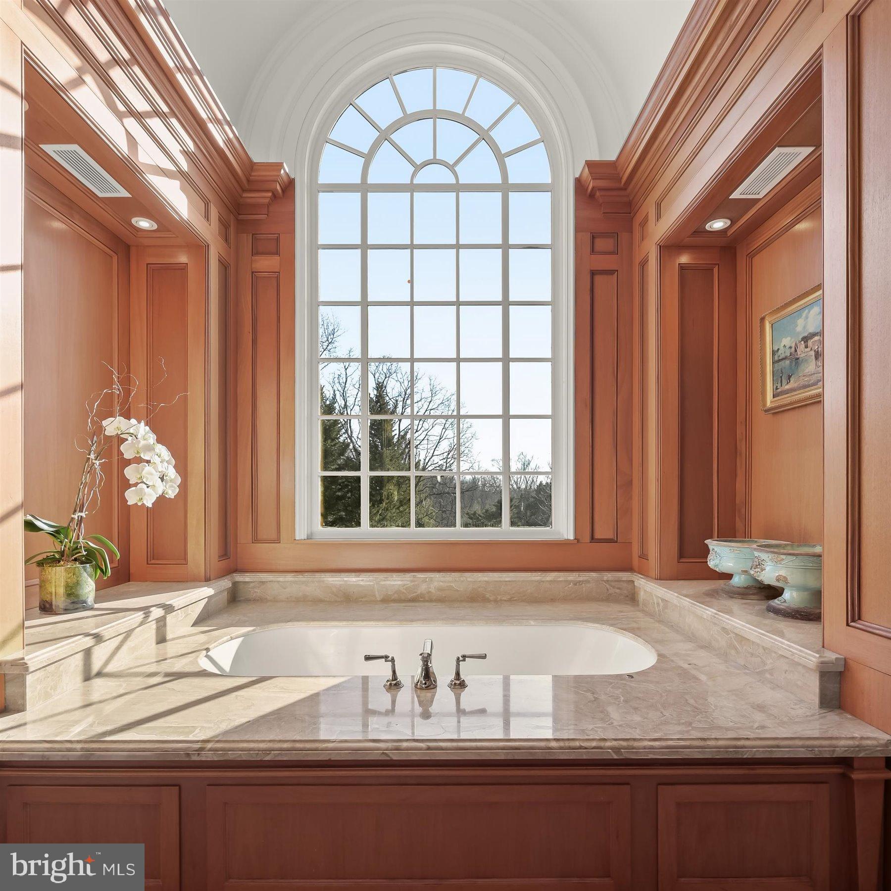 5320 27th Street Northwest Washington, DC 20015 - Photo 29 of 42 a bathroom with a granite countertop sink and a window