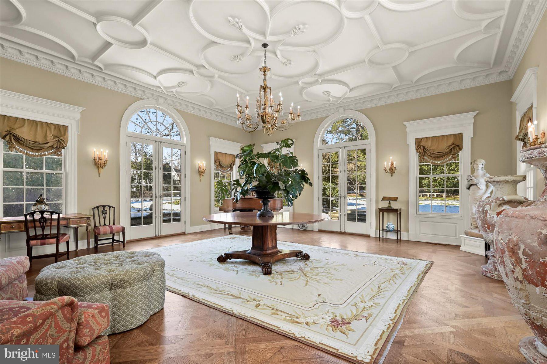 5320 27th Street Northwest Washington, DC 20015 - Photo 6 of 42 a living room with furniture chandelier and a chandelier