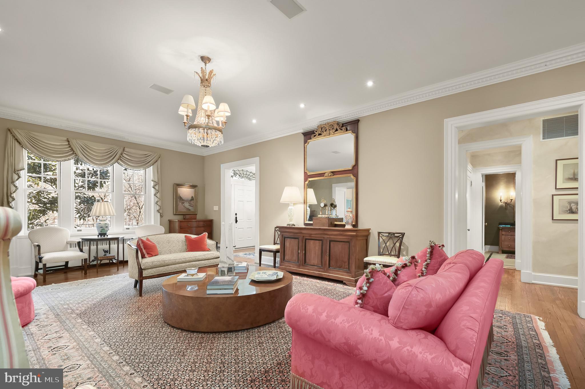5320 27th Street Northwest Washington, DC 20015 - Photo 9 of 42 a living room with furniture and a chandelier