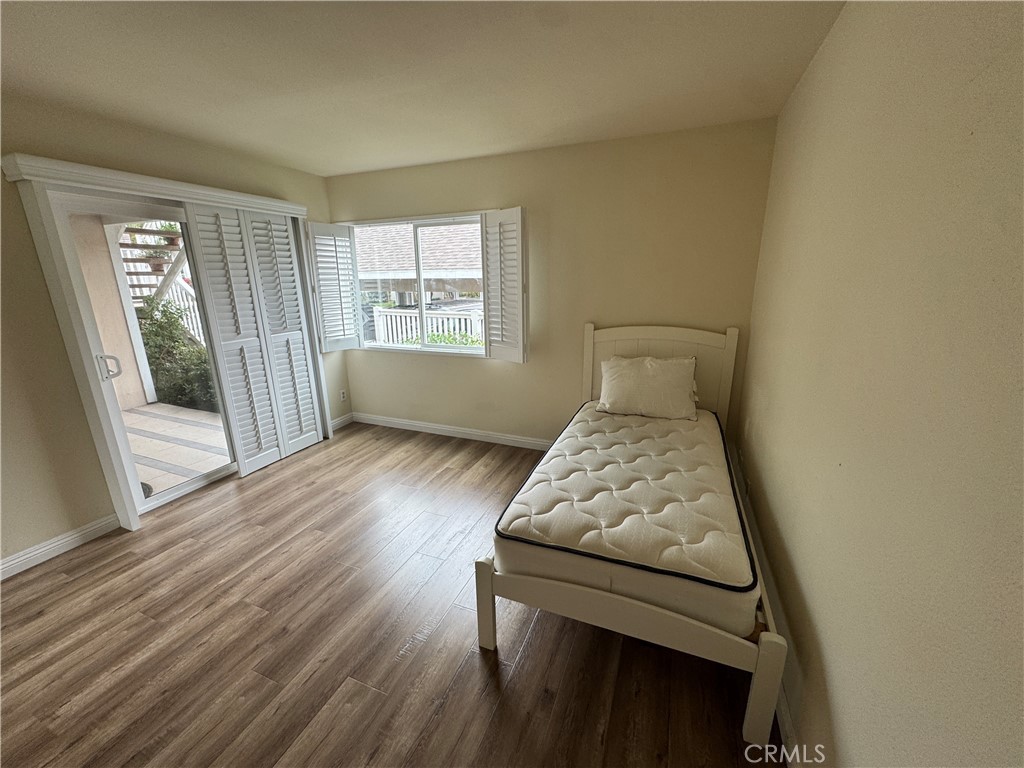 34102 Selva Road, Unit 364 Dana Point, CA 92629 - Photo 12 of 17 a room with wooden floor and furniture