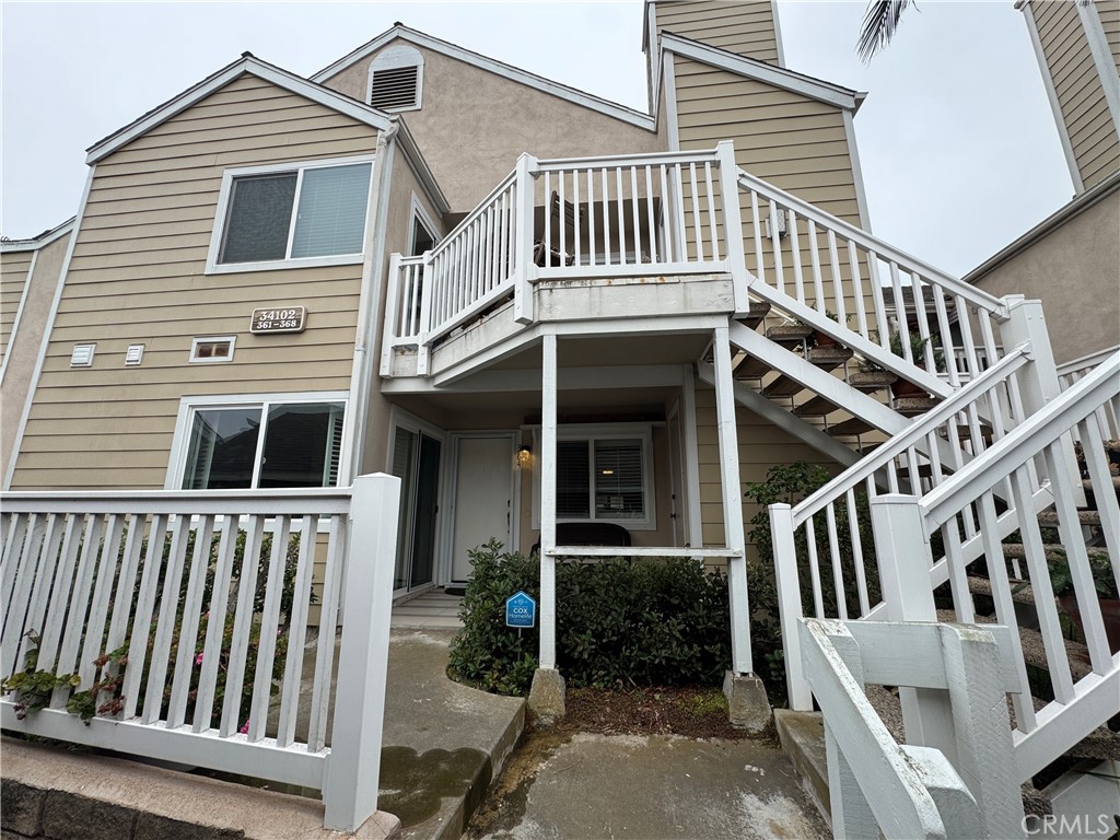 34102 Selva Road, Unit 364 Dana Point, CA 92629 - Photo 4 of 17 a view of a house with wooden deck