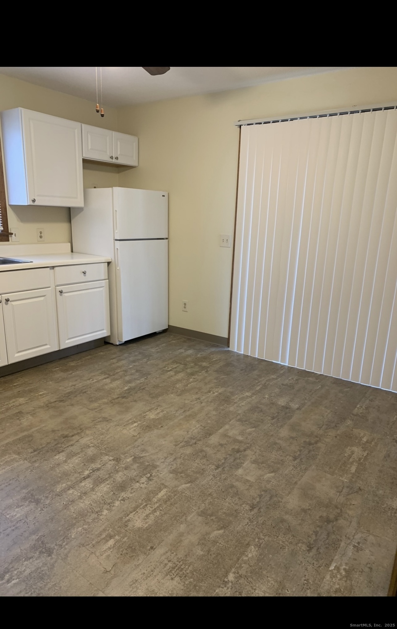 Undisclosed Address Gales Ferry, CT 06335 - Photo 3 of 8 a view of kitchen with white cabinets