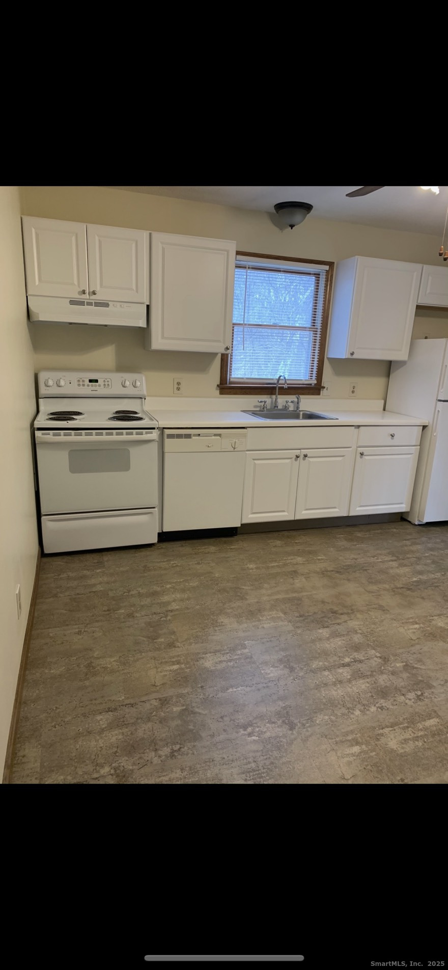 Undisclosed Address Gales Ferry, CT 06335 - Photo 4 of 8 a view of kitchen cabinets and stainless steel appliances