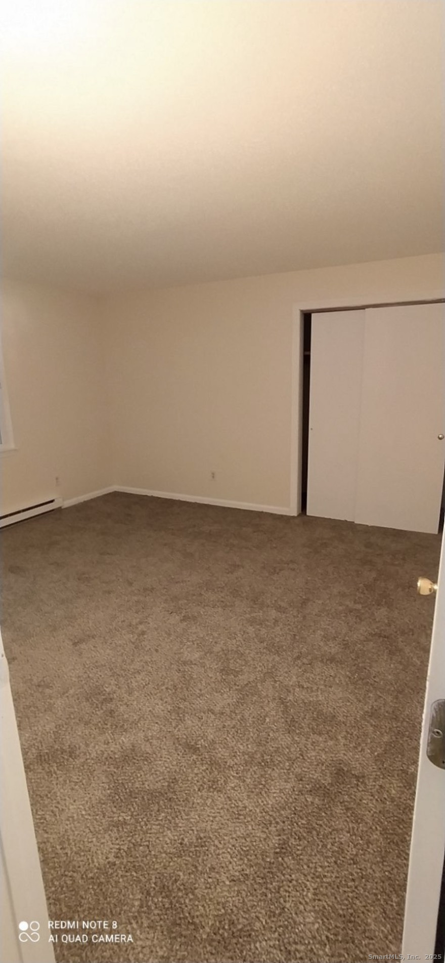 Undisclosed Address Gales Ferry, CT 06335 - Photo 6 of 8 a view of an empty room