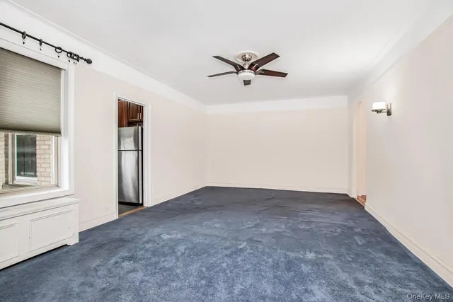 a bathroom with a shower a sink and a mirror
