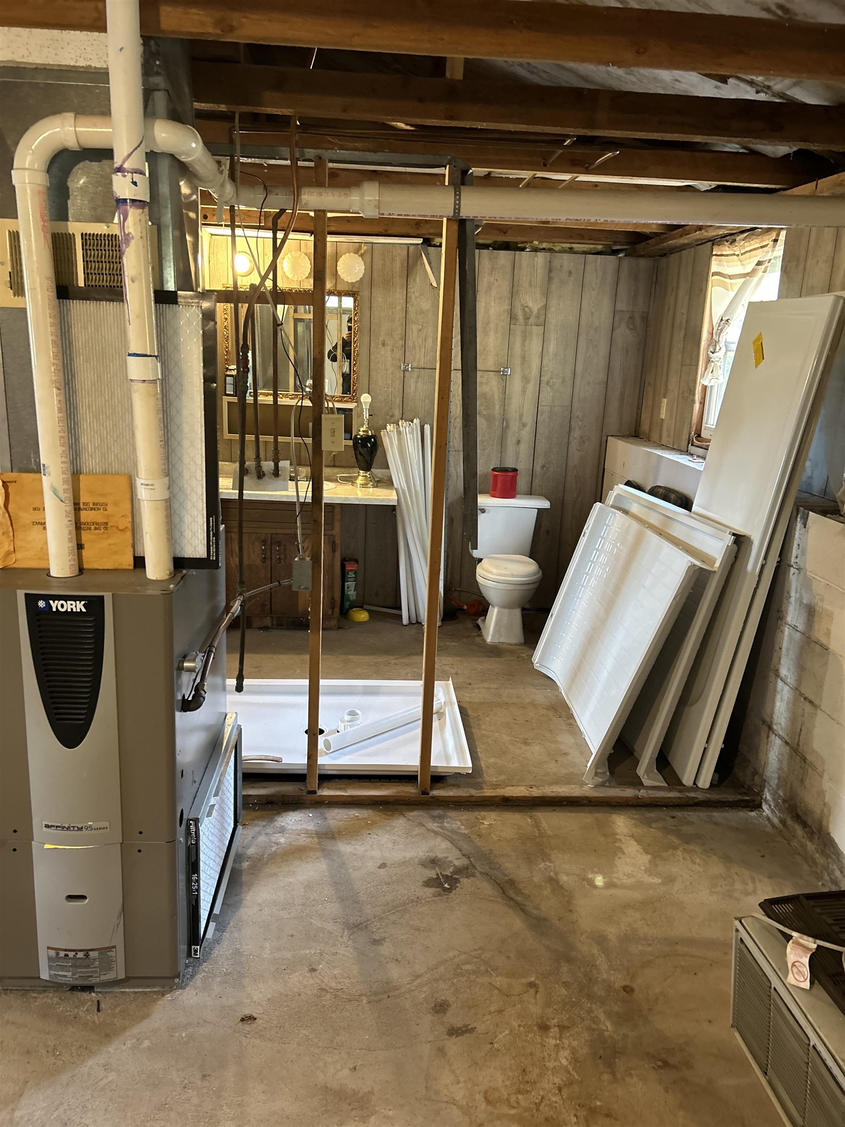 4184 Bergstrom Road Two Harbors, MN 55616 - Photo 11 of 20 Unfinished basement featuring wood walls