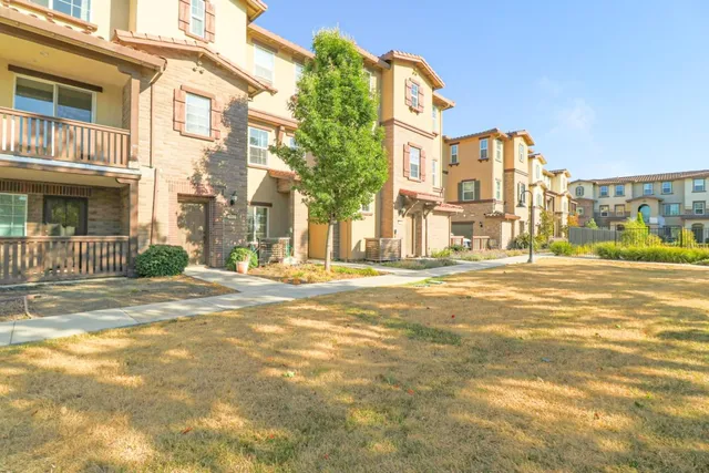 a view of a building with a street